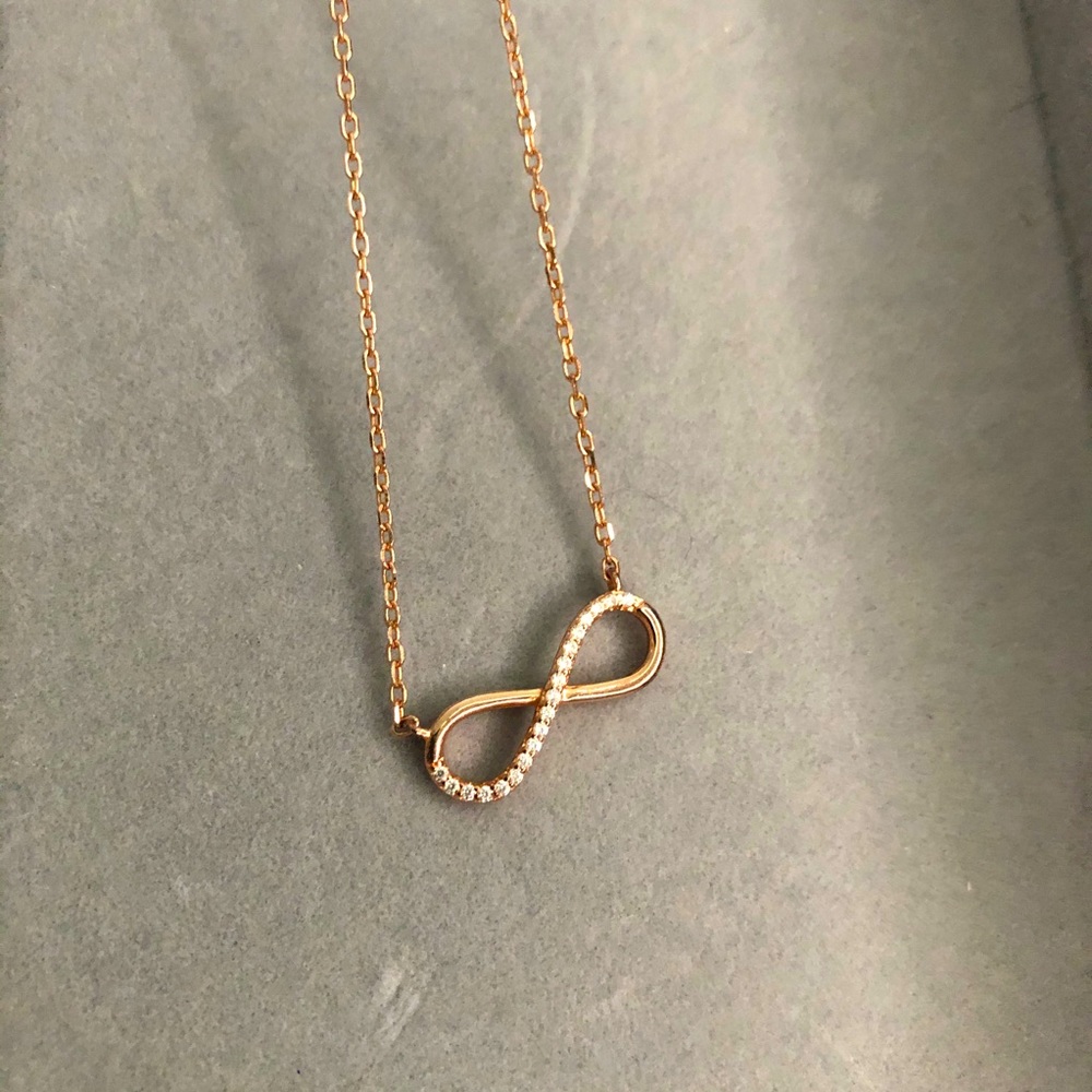 Sterling silver infinity half pavé necklace